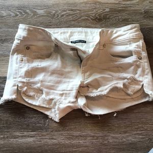 American Eagle white distressed shorts